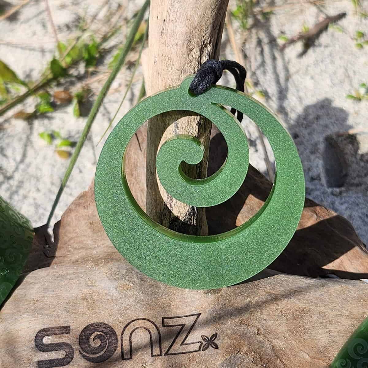 Koru drop pendant in pounamu